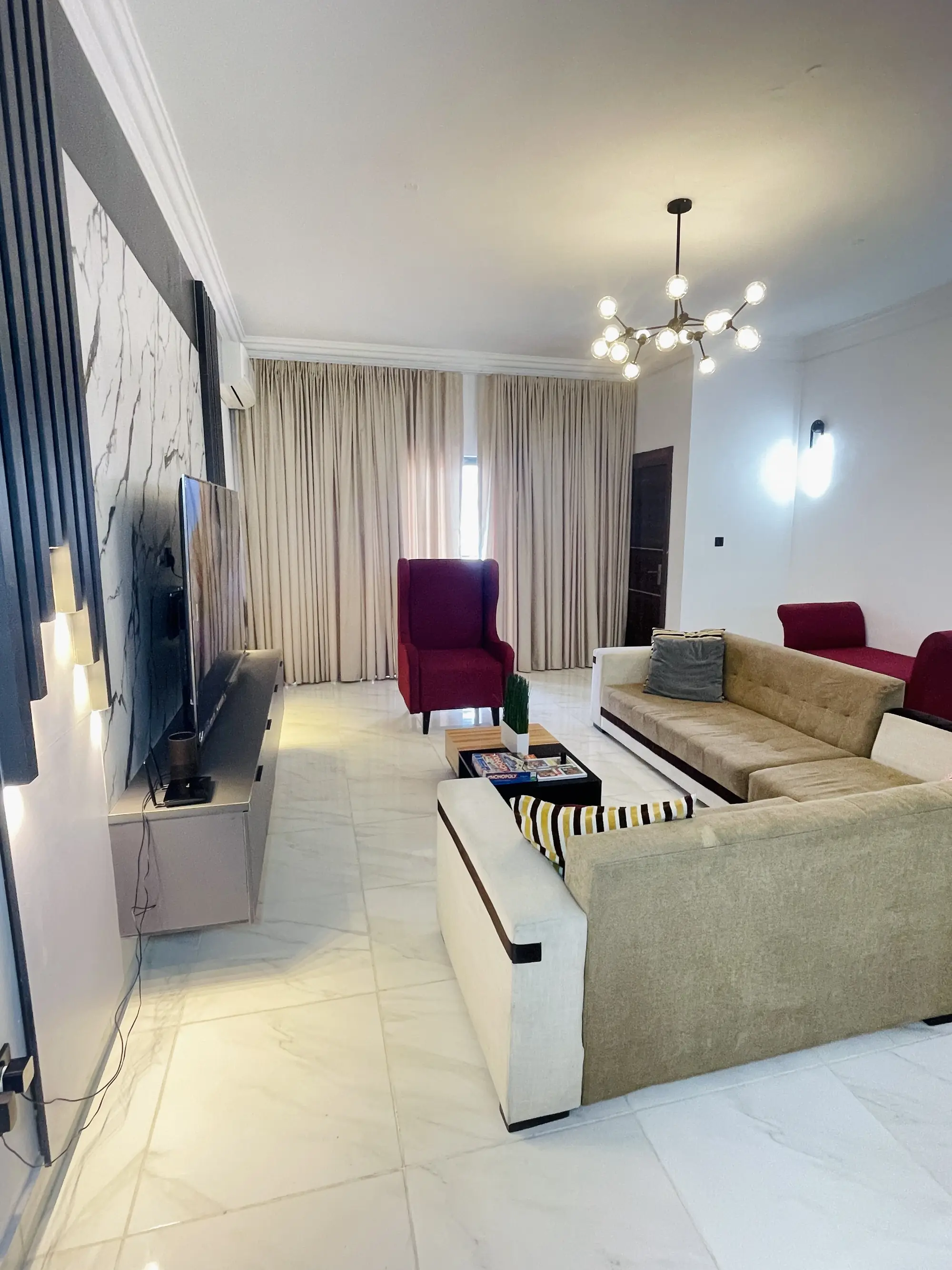 The living and dining area of the Luxome apartment in Oniru, Victoria Island